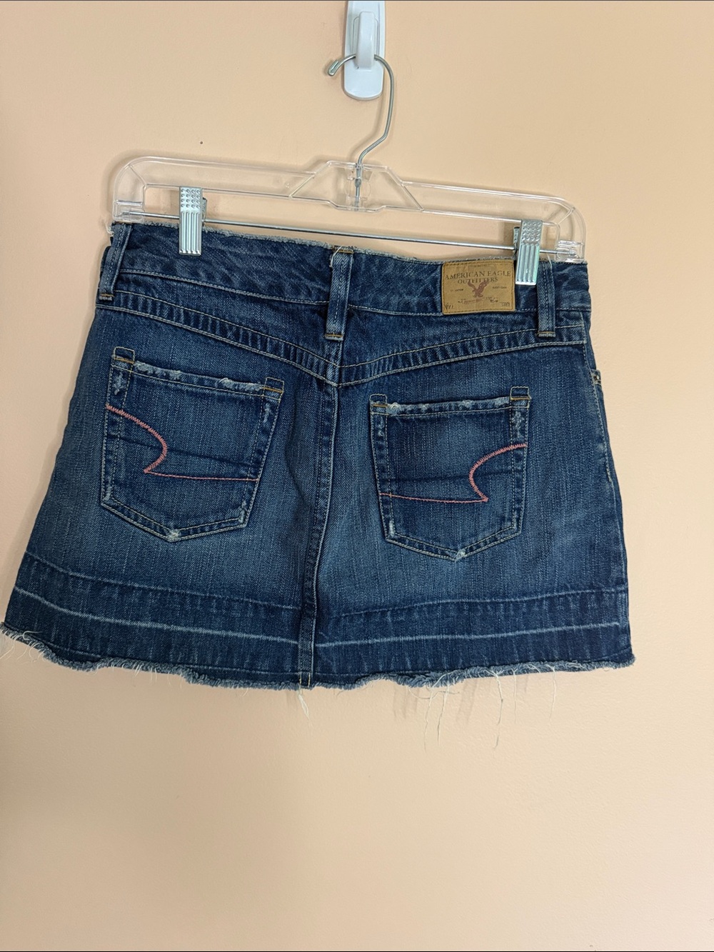 American Eagle Outfitters Dark Blue Denim Skirt with Pink Embroidered Logo - Picture 6 of 9